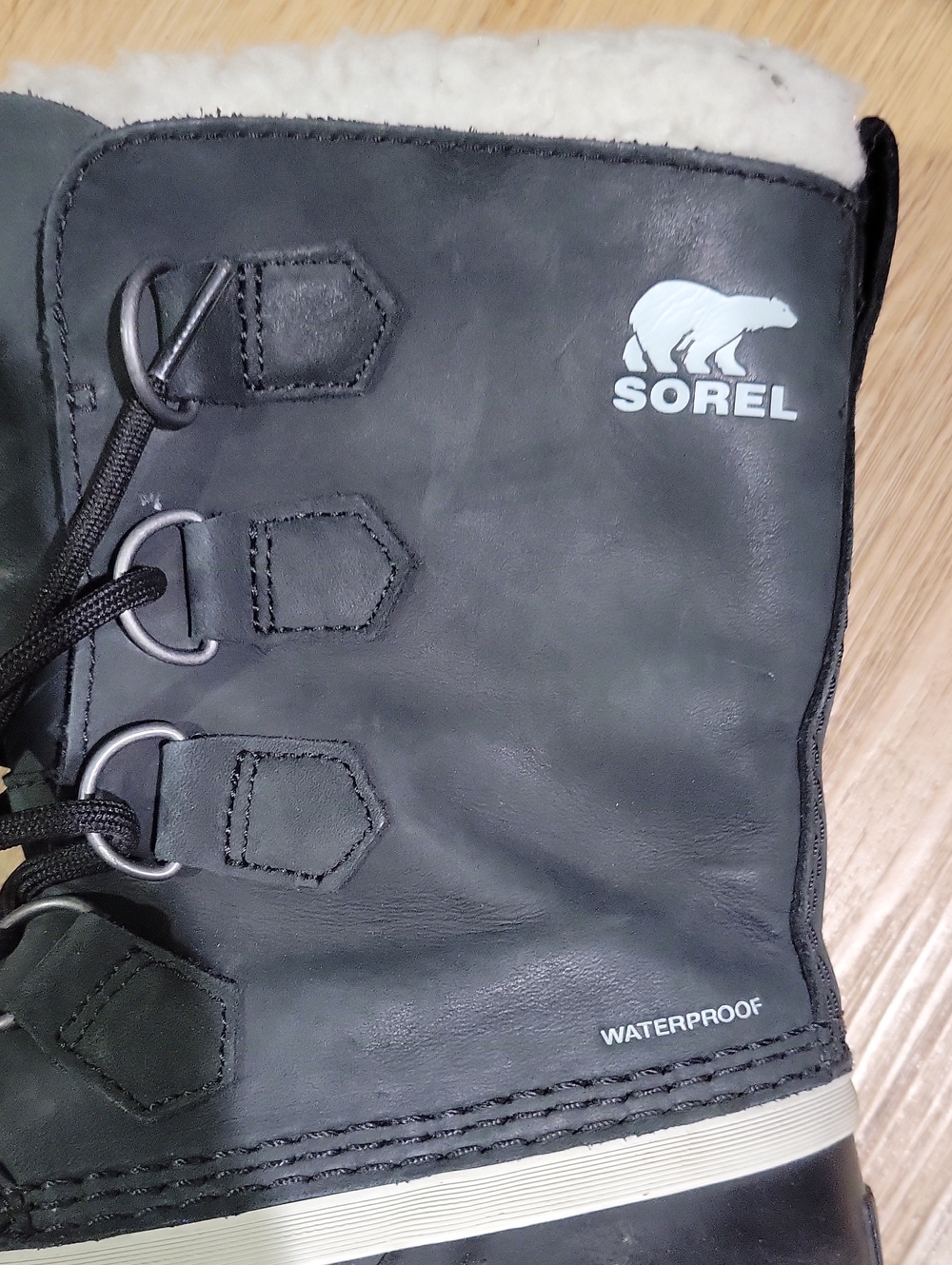 Sorel Black Leather Winter Boot with Cream Shearling Collar